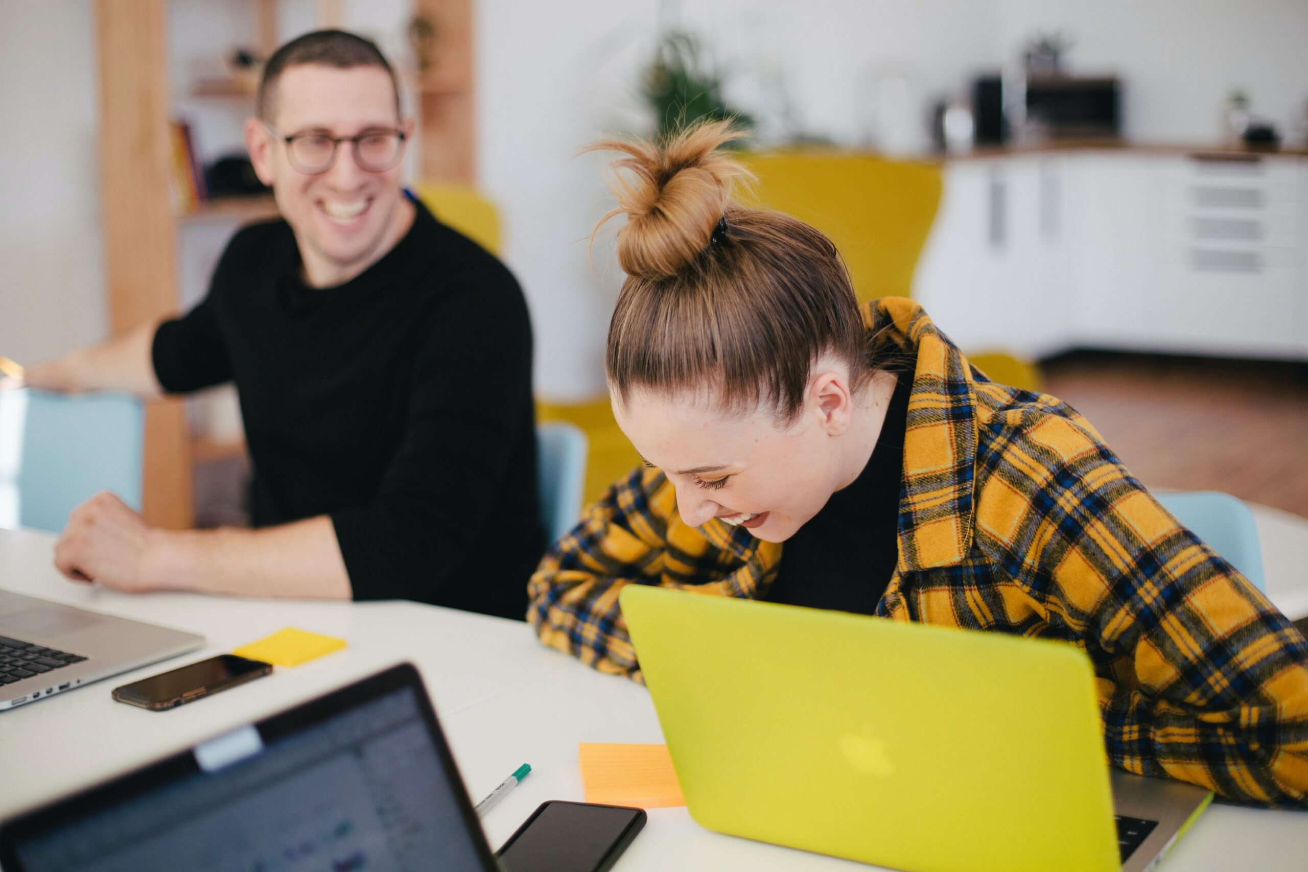 happy-vibes-at-office-a-women-is-laughing-with-her-collegue
